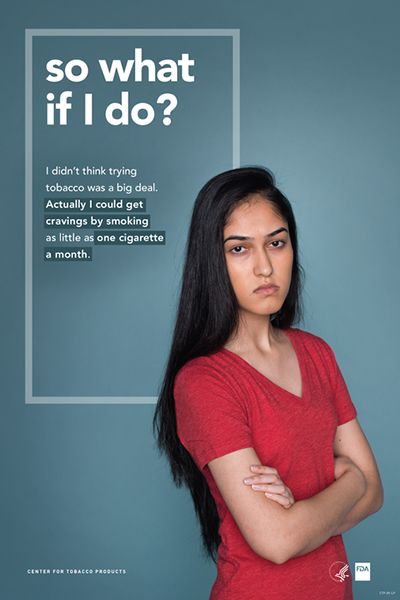 Poster portraying defiant teenage girl challenging the reader and reflecting on her potential tobacco use as it relates to cravings.