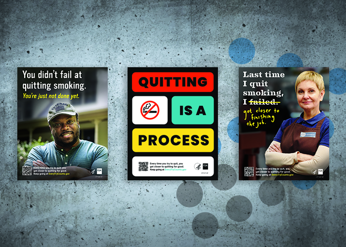 Posters about Quitting Smoking hung on a concrete wall